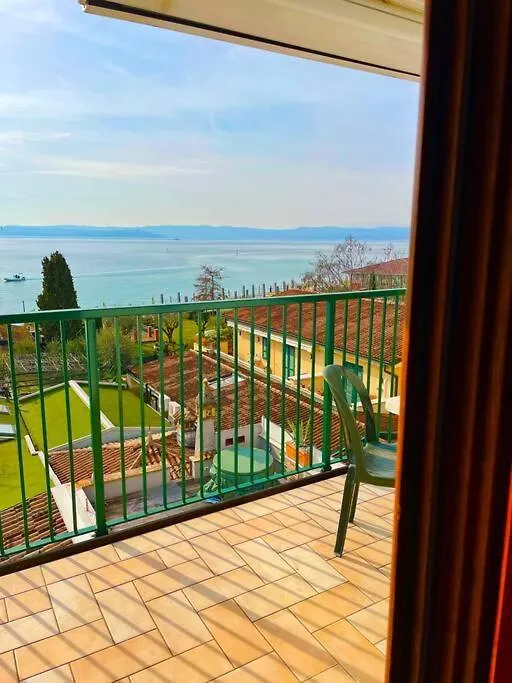 Attico Fronte Lago Con Vista Mozzafiato Sirmione 0*,  Italien